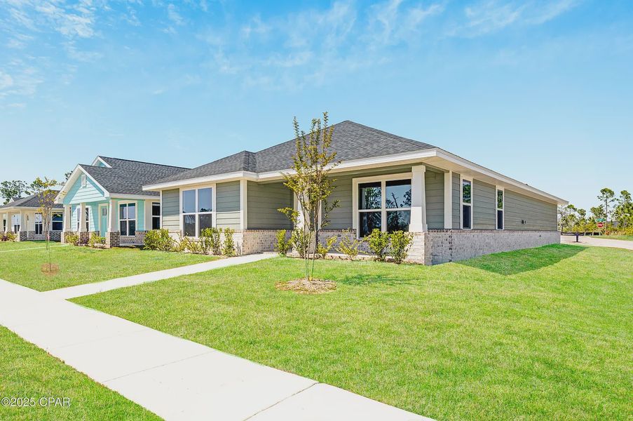 Front exterior of a new home in East Bay, Panama City, FL, highlighting curb appeal (Image 2).