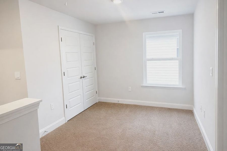 Spacious, unfurnished interior of a new home in Canterbury Villas, Carrollton (Image 16).