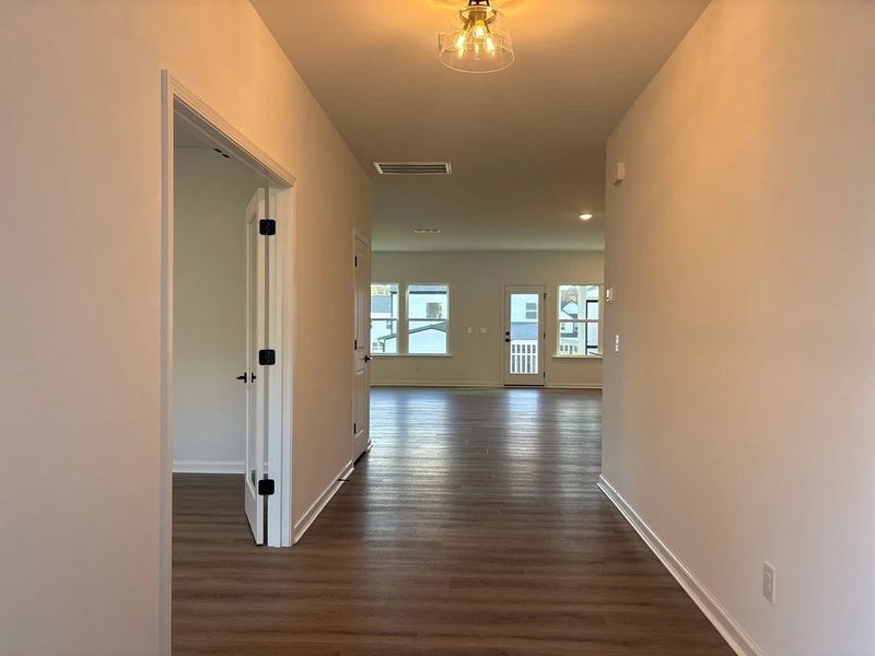 Foyer featuring the AW Collection® Foundry - A stark, stylish entry with dramatic simplicity.