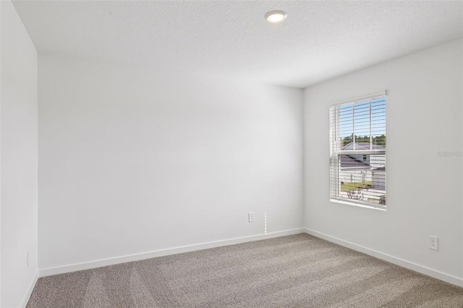 Spacious, unfurnished interior of a new home in Flagler Village - Classic Series, Palm Coast (Image 31). Spacious, unfurnished interior of a new home in Flagler Village - Classic Series, Palm Coast (Image 31).