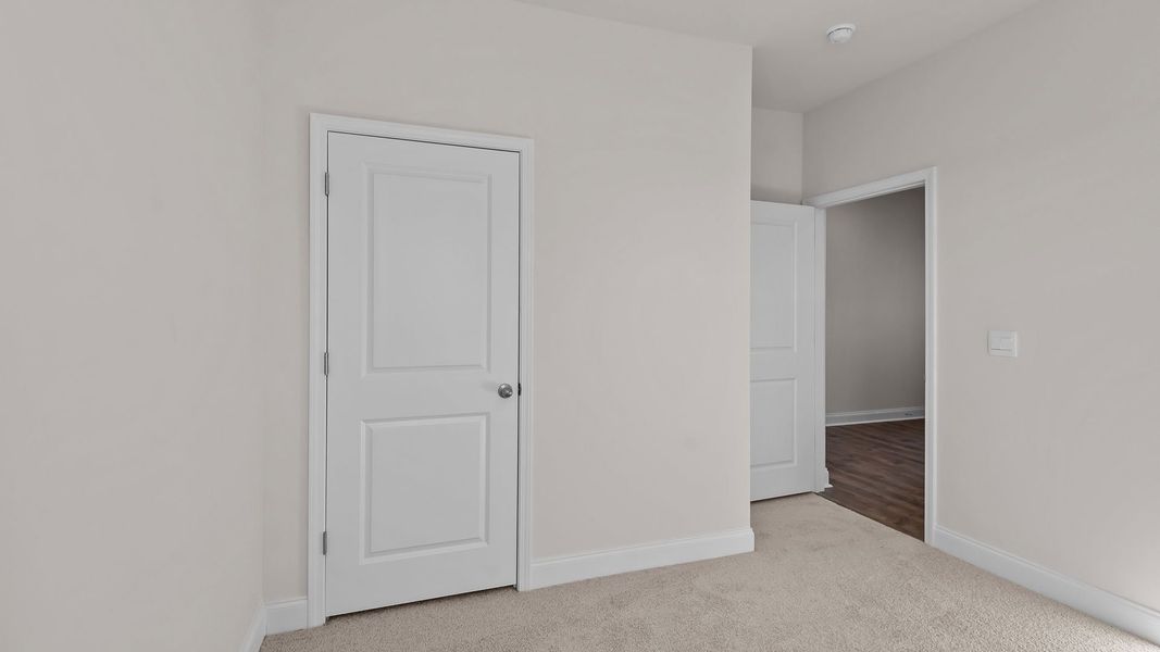 Spacious, unfurnished interior of a new home in Bedford Place, Wilson (Image 12). Spacious, unfurnished interior of a new home in Bedford Place, Wilson (Image 12).
