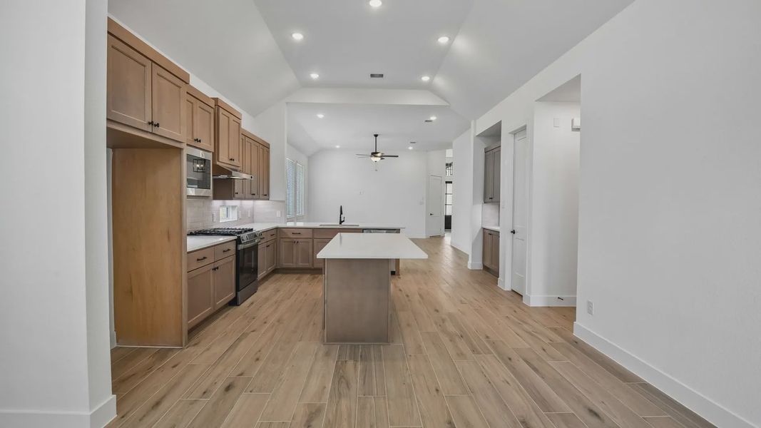 Furnished interior view inside a new home in Artavia, Conroe (Image 9).
