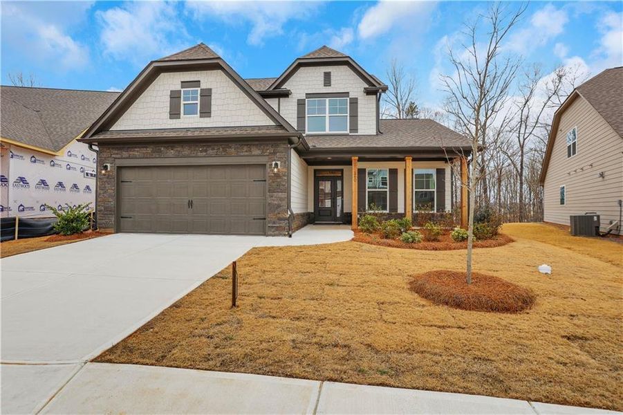 Front exterior of a new home in , Loganville, GA, highlighting curb appeal (Image 18).