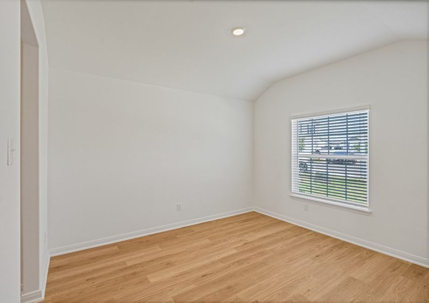 Seperate dining room with a window facing the front yard