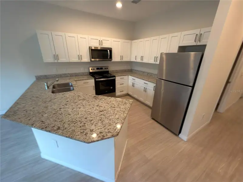 Furnished interior view inside a new home in , Kissimmee (Image 6). Furnished interior view inside a new home in , Kissimmee (Image 6).