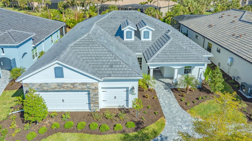 Representative exterior photo of a completed home built from the Captiva by Neal Communities in Boca Royale Golf & Country Club at Wellen Park, Englewood, FL (Image 2).