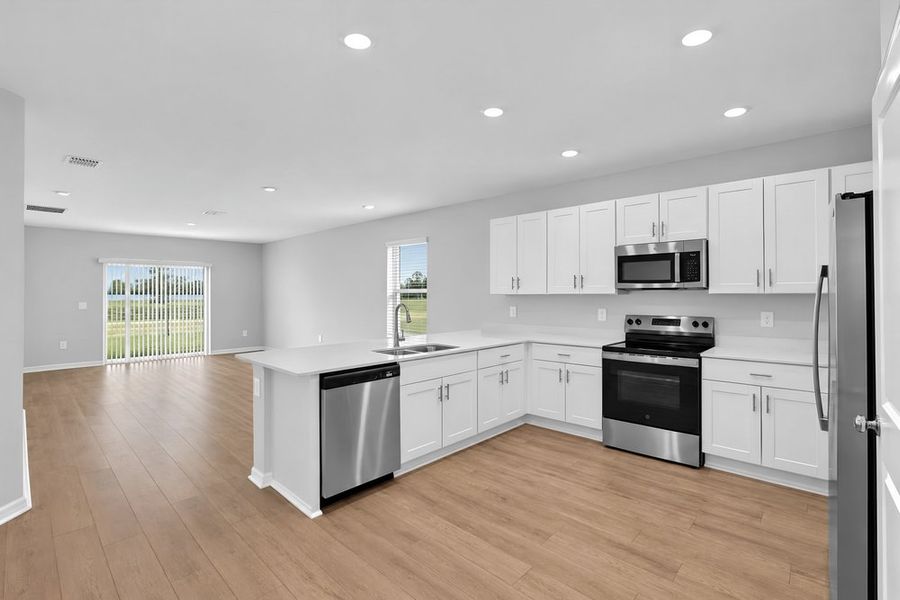Furnished interior view inside a new home in Palm Wind, Hudson (Image 5).