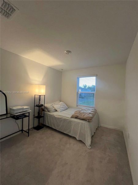 Furnished interior view inside a new home in The Townhomes at Bellalago, Kissimmee (Image 14).