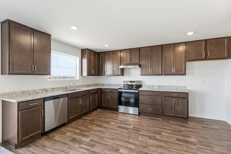 Furnished interior view inside a new home in Murphy Creek Classic, Aurora (Image 5).