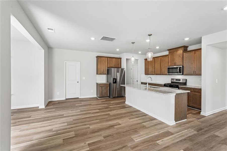 Furnished interior view inside a new home in Northwoods at Mirror Lake, Villa Rica (Image 7).