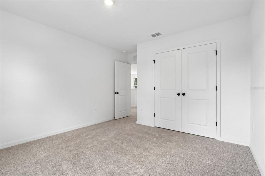 Spacious, unfurnished interior of a new home in Estes Reserve, Eustis (Image 18). Spacious, unfurnished interior of a new home in Estes Reserve, Eustis (Image 18).