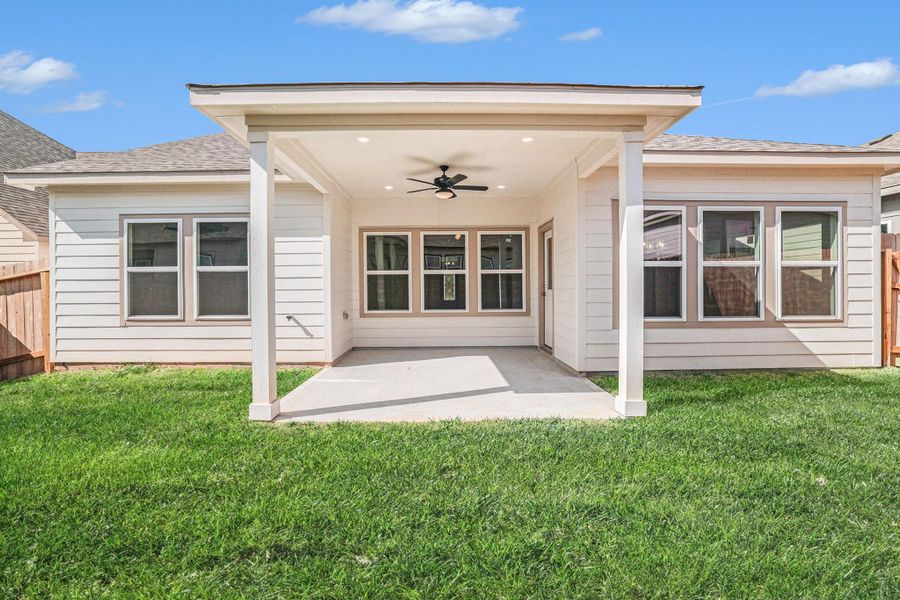 Exterior details and patio area of a home in Clear View Estates, Willis (Image 3).