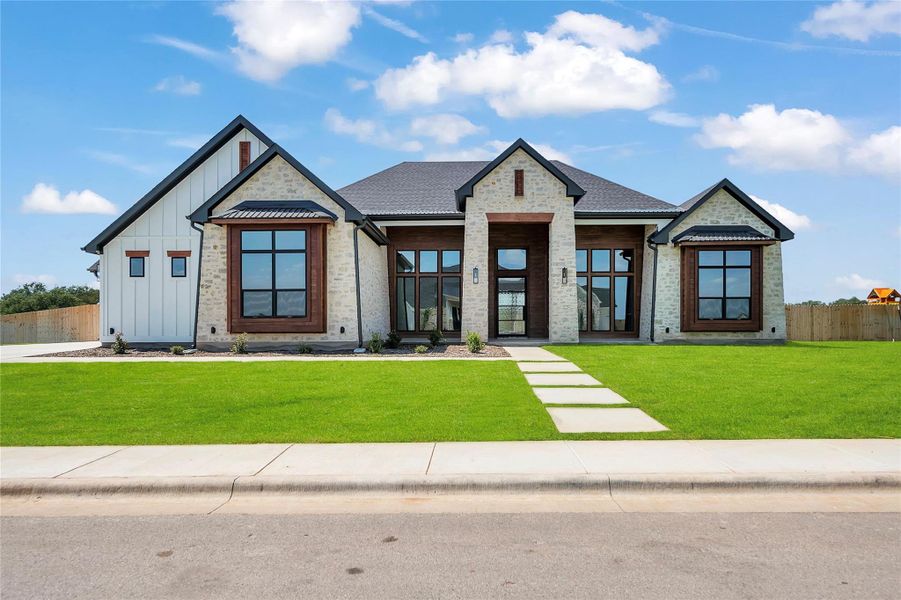 Please Note: These exterior photos are not of the actual design but are of a completed one with a similar floor plan. Finishes, features, and layouts may vary. Please Note: These exterior photos are not of the actual design but are of a completed one with a similar floor plan. Finishes, features, and layouts may vary.