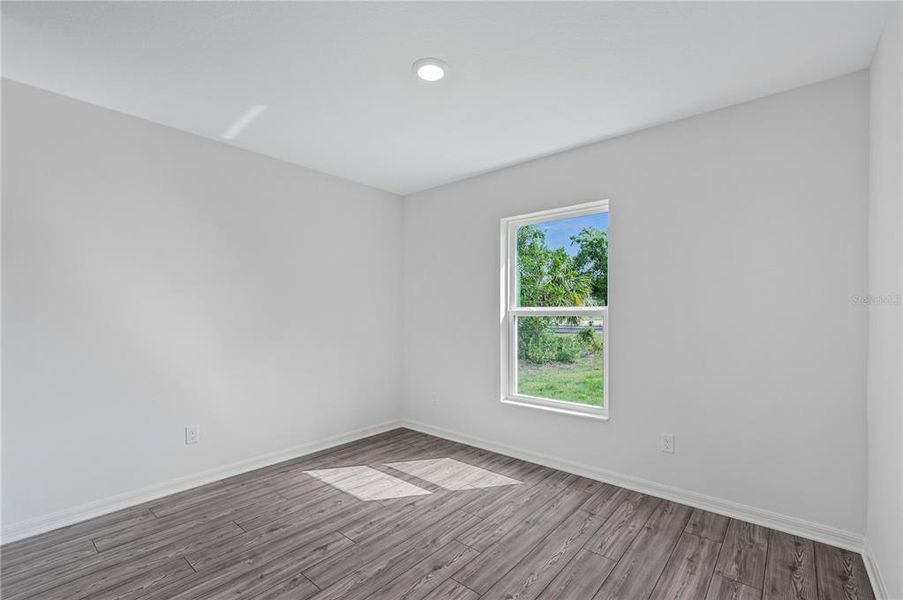 Spacious, unfurnished interior of a new home in , Port Charlotte (Image 12).