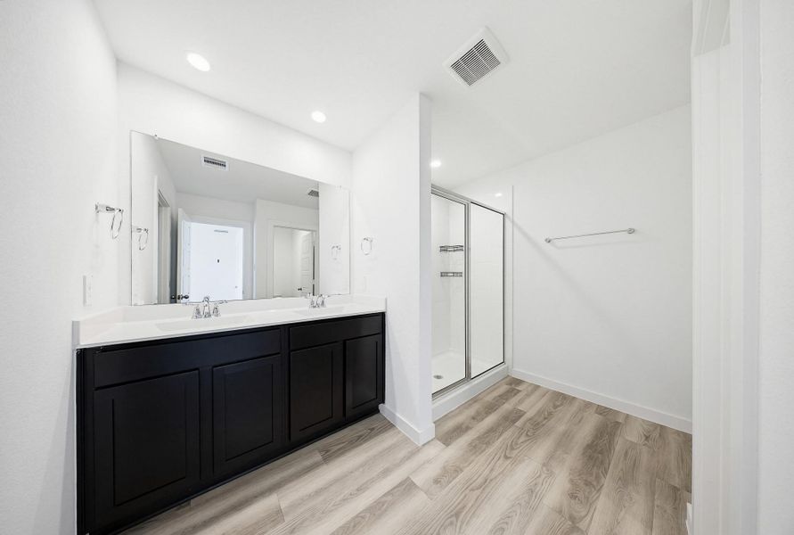 Primary bathroom features double sinks