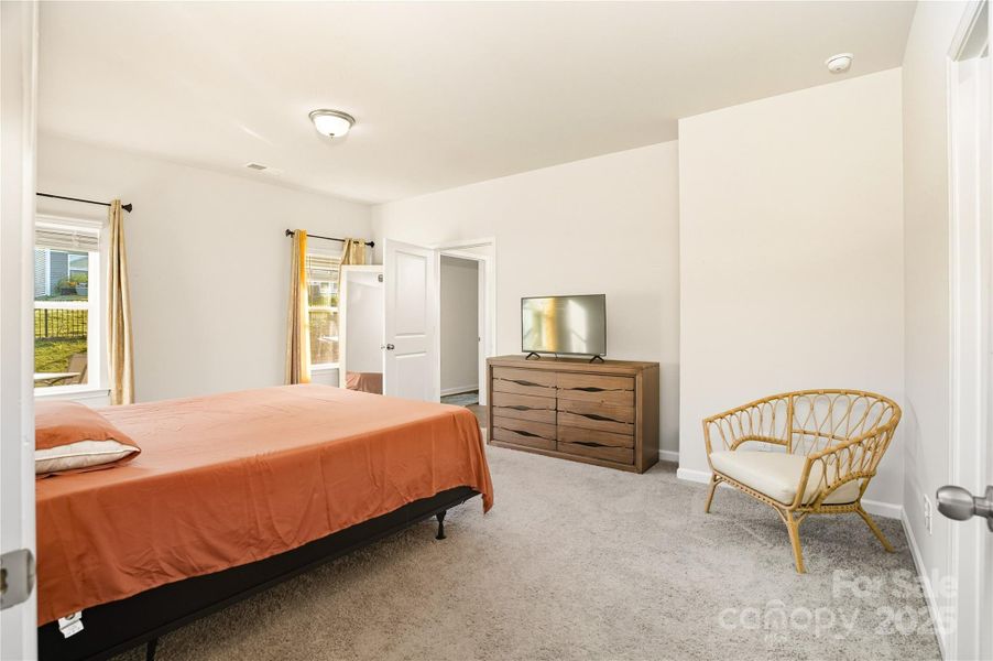 Furnished interior view inside a new home in Orchard Creek, Charlotte (Image 11).