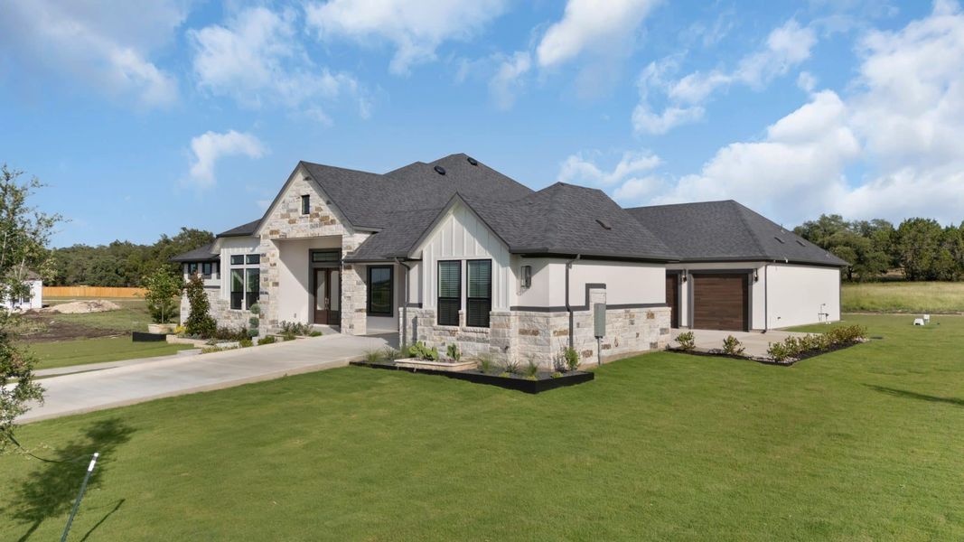 Front exterior of a new home in Feathergrass, Florence, TX, highlighting curb appeal (Image 36).