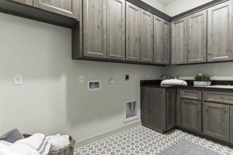 Laundry room in Ashlyn home at Belle Oaks, Bulverde TX