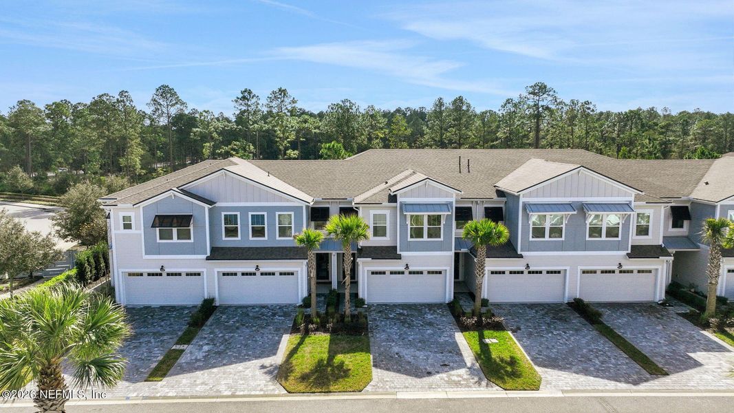 Front exterior of a new home in , Jacksonville, FL, highlighting curb appeal (Image 26).