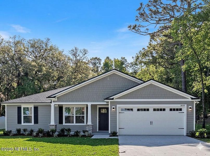 Front exterior of a new home in , Jacksonville, FL, highlighting curb appeal (Image 1). Front exterior of a new home in , Jacksonville, FL, highlighting curb appeal (Image 1).