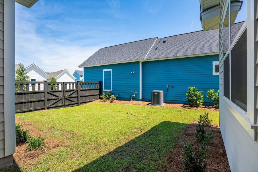 Exterior details and patio area of a home in The Domus Collection at Midtown Nexton, Summerville (Image 24).