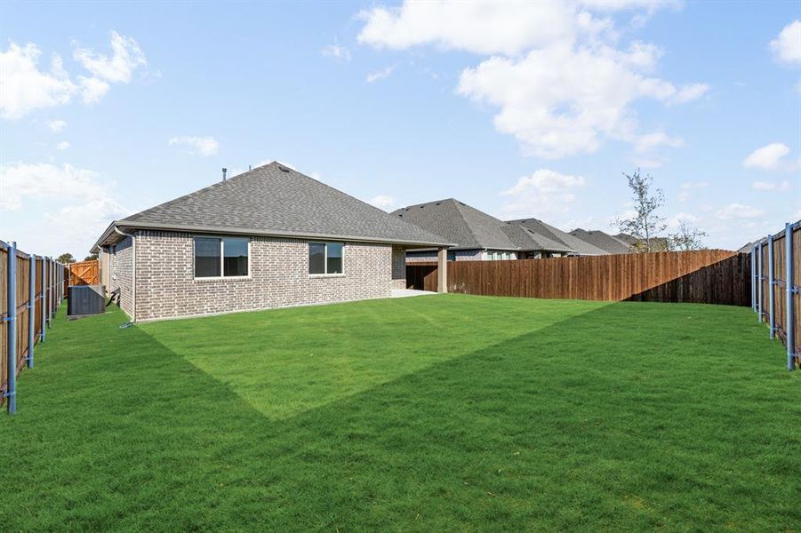 Exterior details and patio area of a home in Stone River Glen 50s, Royse City (Image 4). Exterior details and patio area of a home in Stone River Glen 50s, Royse City (Image 4).