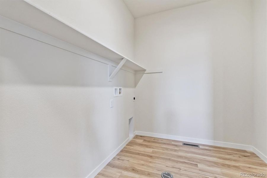 Spacious, unfurnished interior of a new home in Floret Collection at Parkdale Commons, Lafayette (Image 15).