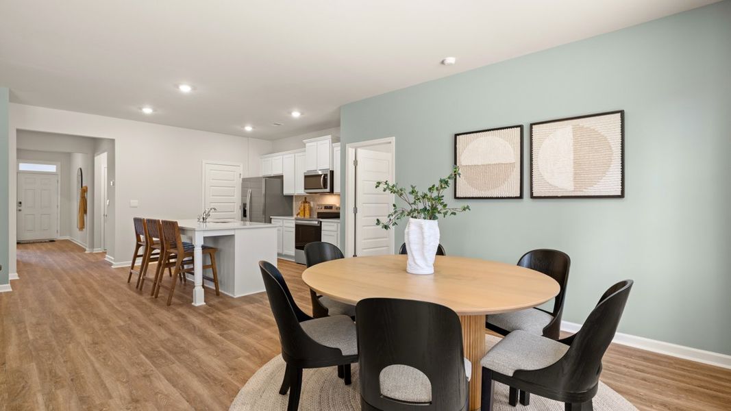 Representative furnished interior of a home built from the ARIA Express by D.R. Horton in WillowBrook, Winder (Image 12).