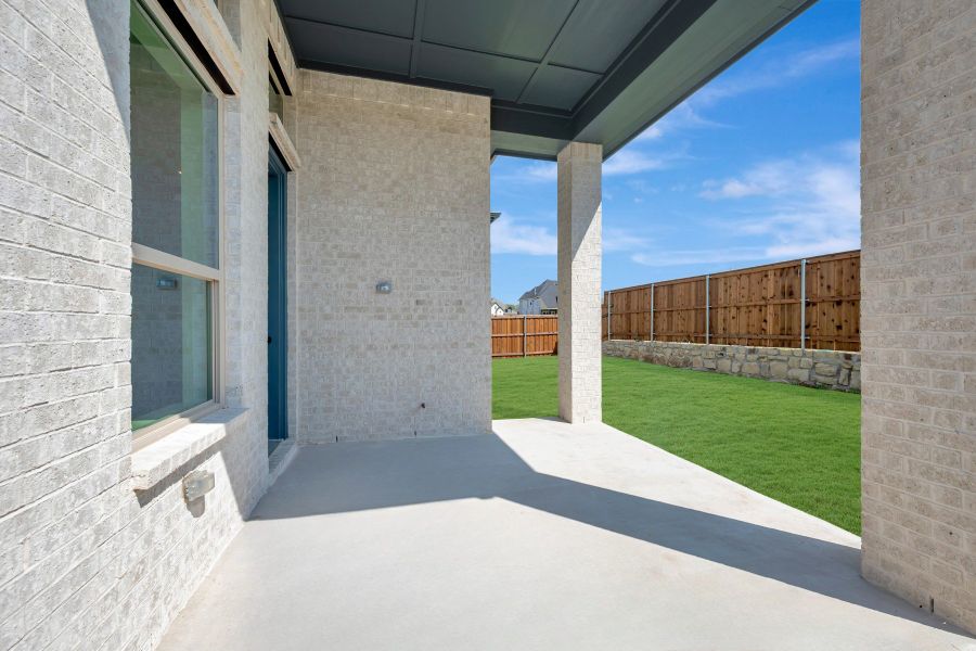 Exterior details and patio area of a home in The Parks at Wilson Creek, Celina (Image 4). Exterior details and patio area of a home in The Parks at Wilson Creek, Celina (Image 4).
