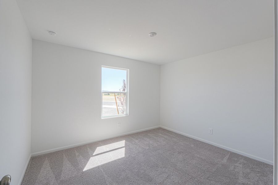 A room with a window. A room with a window.