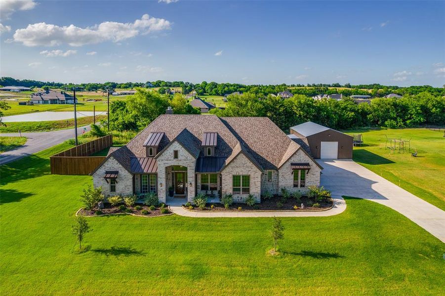 Front exterior of a new home in Error: Invalid Content, Van Alstyne, TX, highlighting curb appeal (Image 1). Front exterior of a new home in Error: Invalid Content, Van Alstyne, TX, highlighting curb appeal (Image 1).