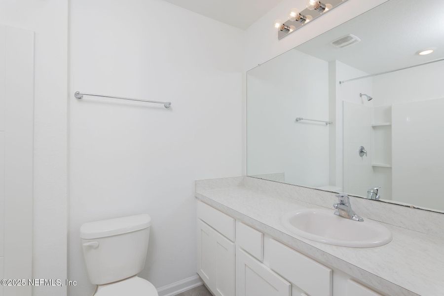 Furnished interior view inside a new home in Equinox East, Jacksonville (Image 9).