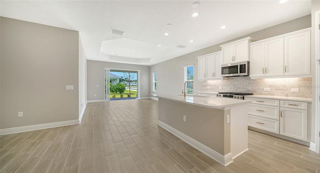 Furnished interior view inside a new home in Wildleaf at North River Ranch, Parrish (Image 5).