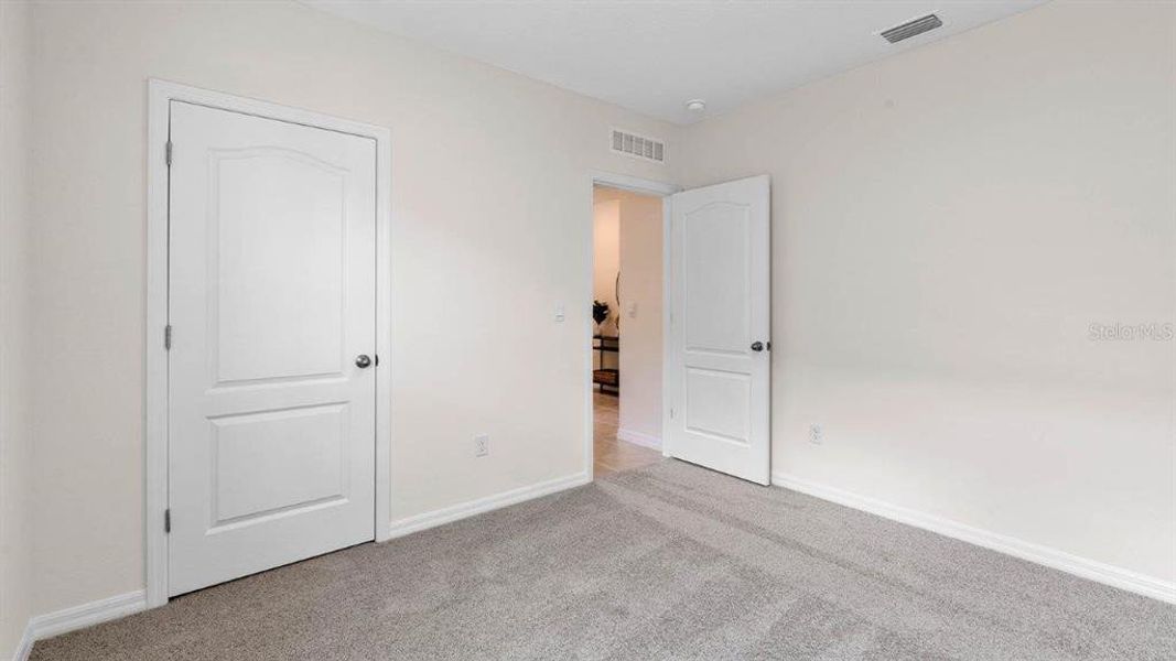 Spacious, unfurnished interior of a new home in Villamar, Winter Haven (Image 35).