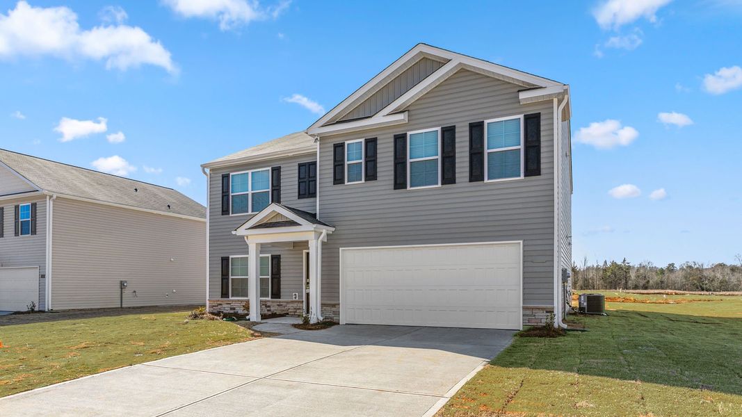 Front exterior of a new home in Madeline Farm, New Bern, NC, highlighting curb appeal (Image 22).