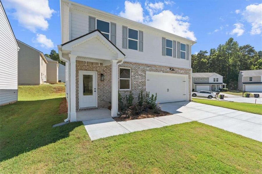 Front exterior of a new home in , Villa Rica, GA, highlighting curb appeal (Image 16). Front exterior of a new home in , Villa Rica, GA, highlighting curb appeal (Image 16).