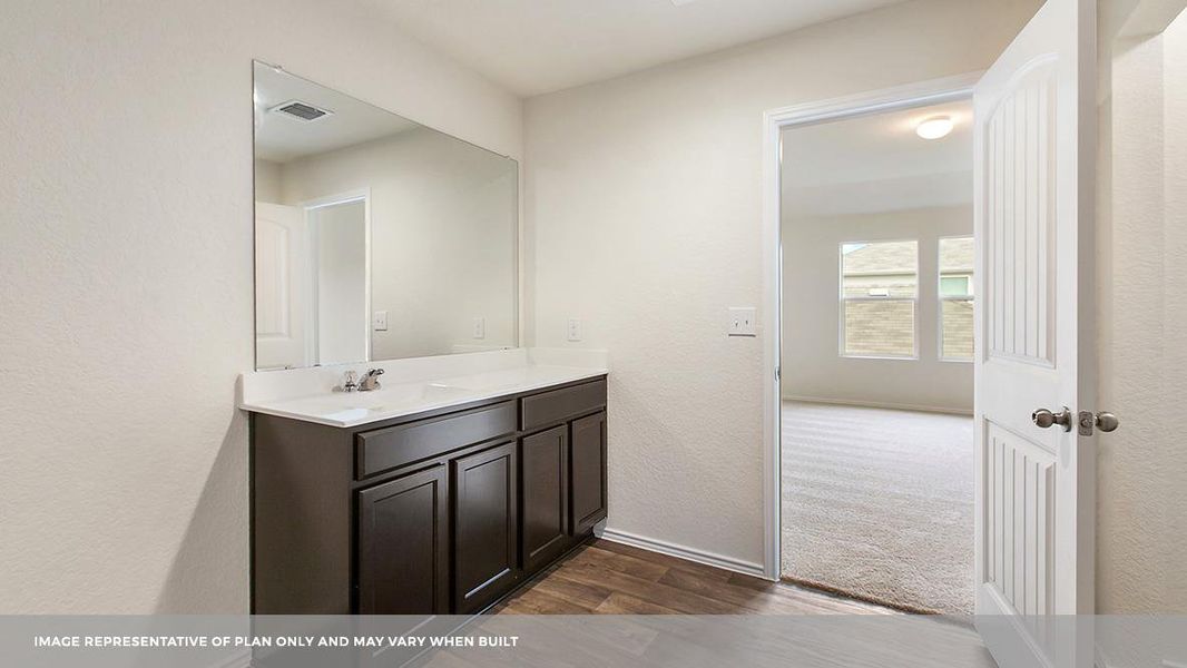 Furnished interior view inside a new home in Carillon, Manor (Image 9).