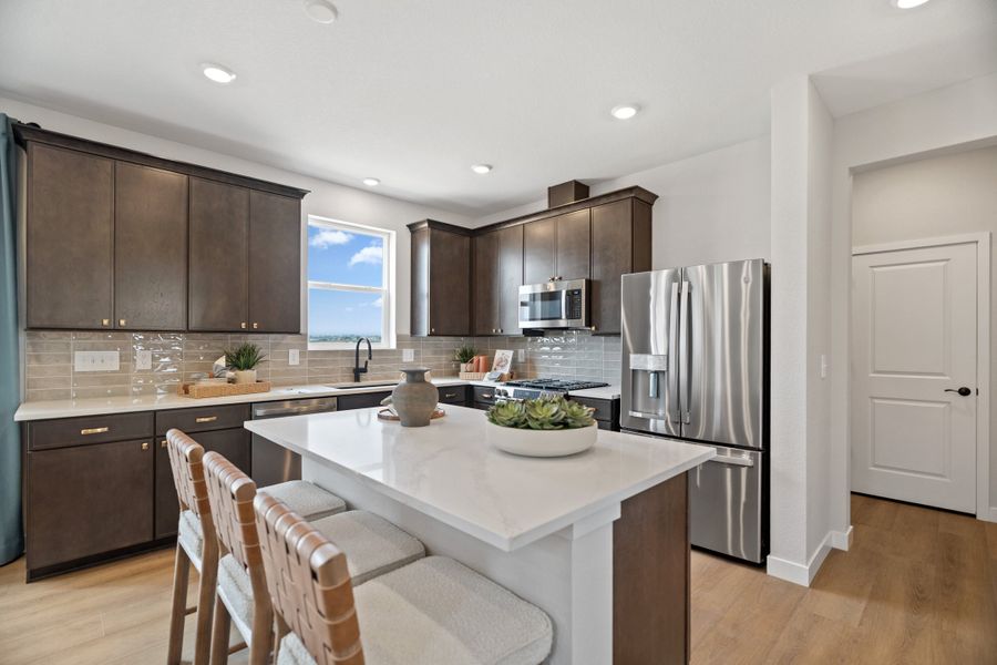 Representative furnished interior of a home built from the 4006 by Risewell Homes in Mead Crossing, Mead (Image 7).