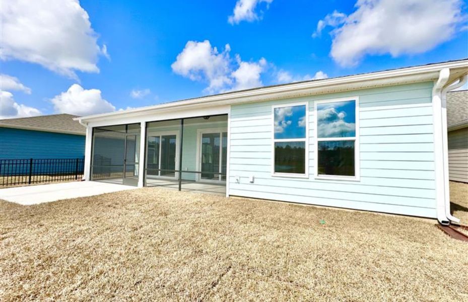 Exterior details and patio area of a home in Forestwood, Longs (Image 3).