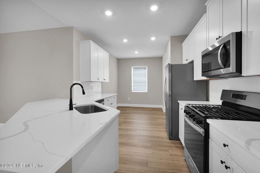 Furnished interior view inside a new home in Jennings Farm, Middleburg (Image 4).