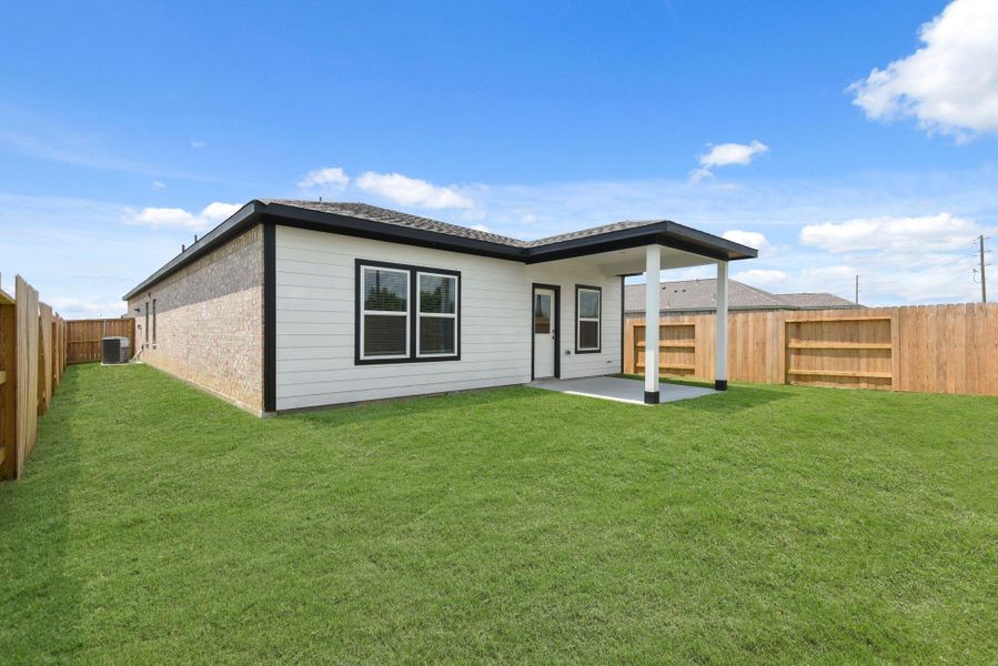 Exterior details and patio area of a home in River Ranch Trails, Dayton (Image 17). Exterior details and patio area of a home in River Ranch Trails, Dayton (Image 17).