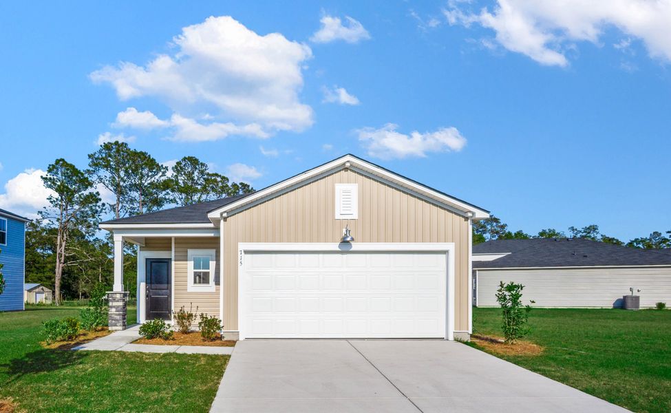 Front exterior of a new home in Warner Crossing, Loris, SC, highlighting curb appeal (Image 1). Front exterior of a new home in Warner Crossing, Loris, SC, highlighting curb appeal (Image 1).