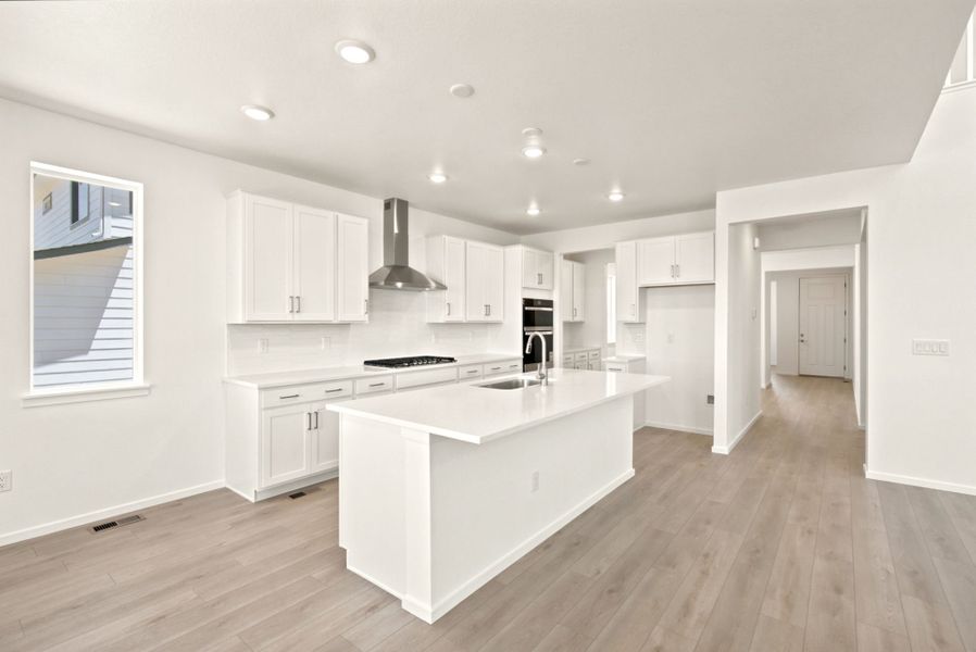 Furnished interior view inside a new home in Cordovan, Firestone (Image 11).