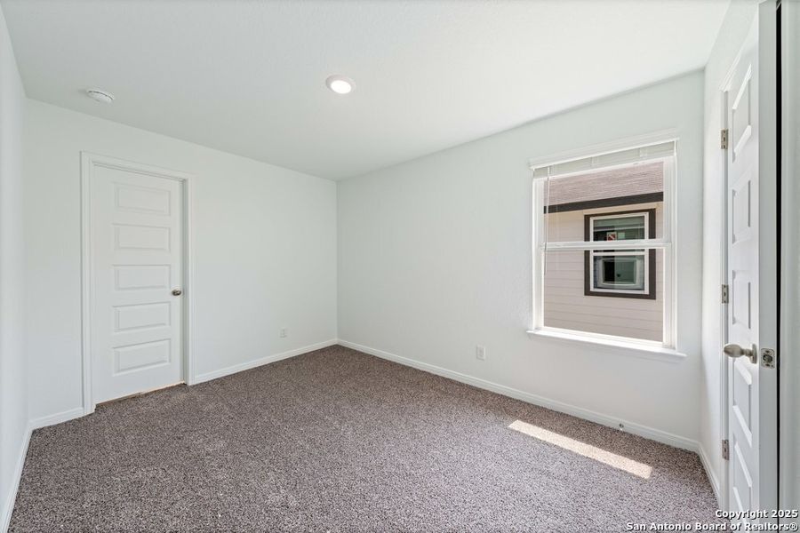 Spacious, unfurnished interior of a new home in The Preserve at Candlemeadow, San Antonio (Image 20).