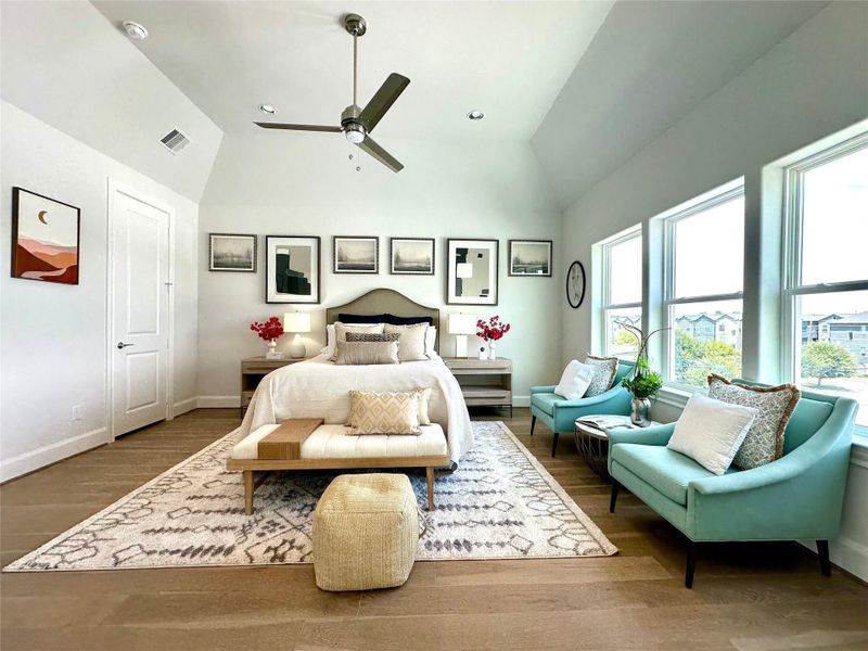 Large 15x17 primary bedroom boasts loads of natural light.