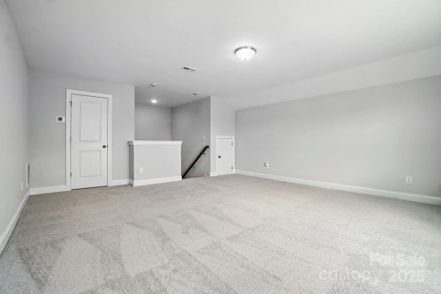 Spacious, unfurnished interior of a new home in Hampton Woods, Charlotte (Image 34).