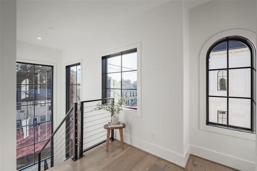 Entrance foyer with light hardwood / wood-style floors