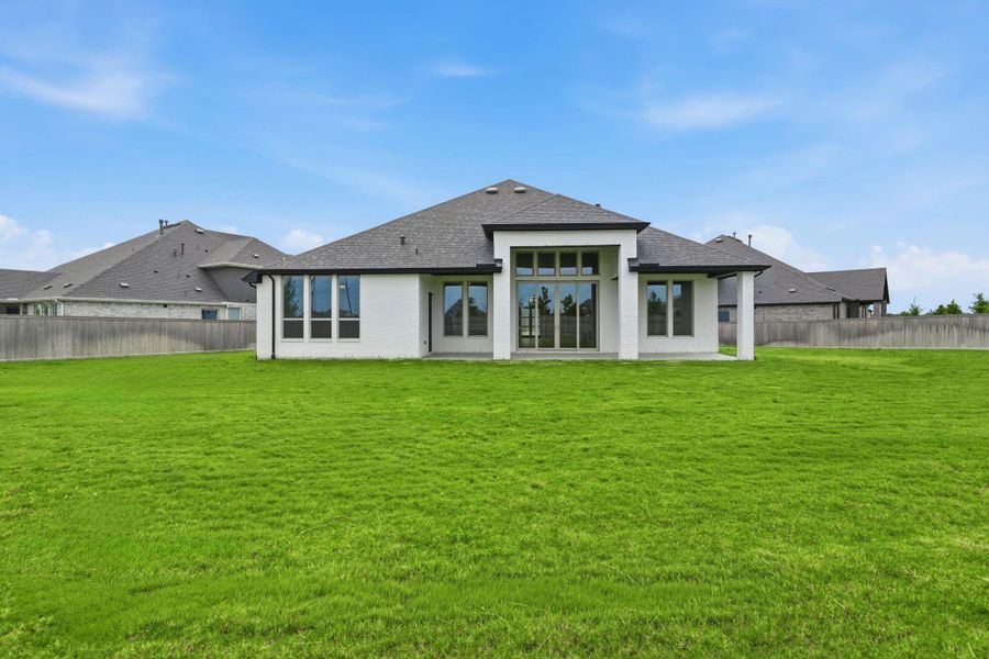 Covered porch and large backyard