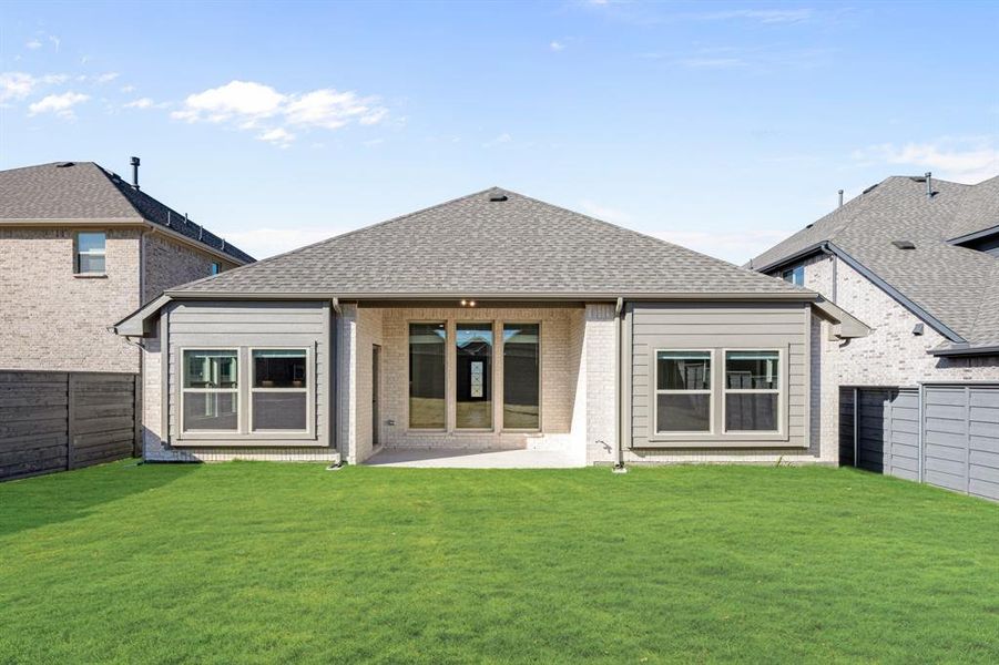 Exterior details and patio area of a home in Union Park Classic 55, Little Elm (Image 24).
