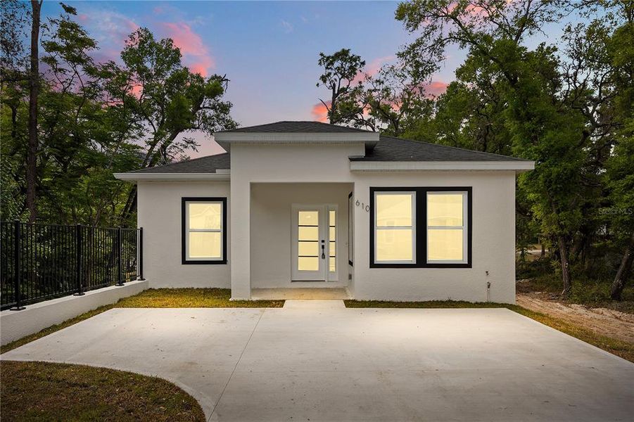 Front exterior of a new home in , Deland, FL, highlighting curb appeal (Image 22). Front exterior of a new home in , Deland, FL, highlighting curb appeal (Image 22).